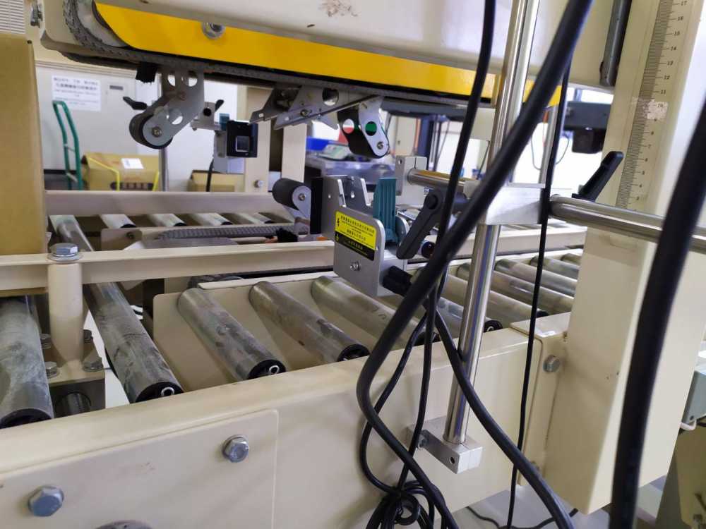 (紙箱噴印機)雙面封箱機-RA2 勁騰興業 噴印機 噴碼機 噴字機